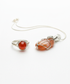Clean studio shot of coordinated carnelian jewelry set