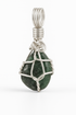Emerald pendant with white studio lighting