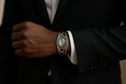 Man in black suit wearing the sterling silver bracelet