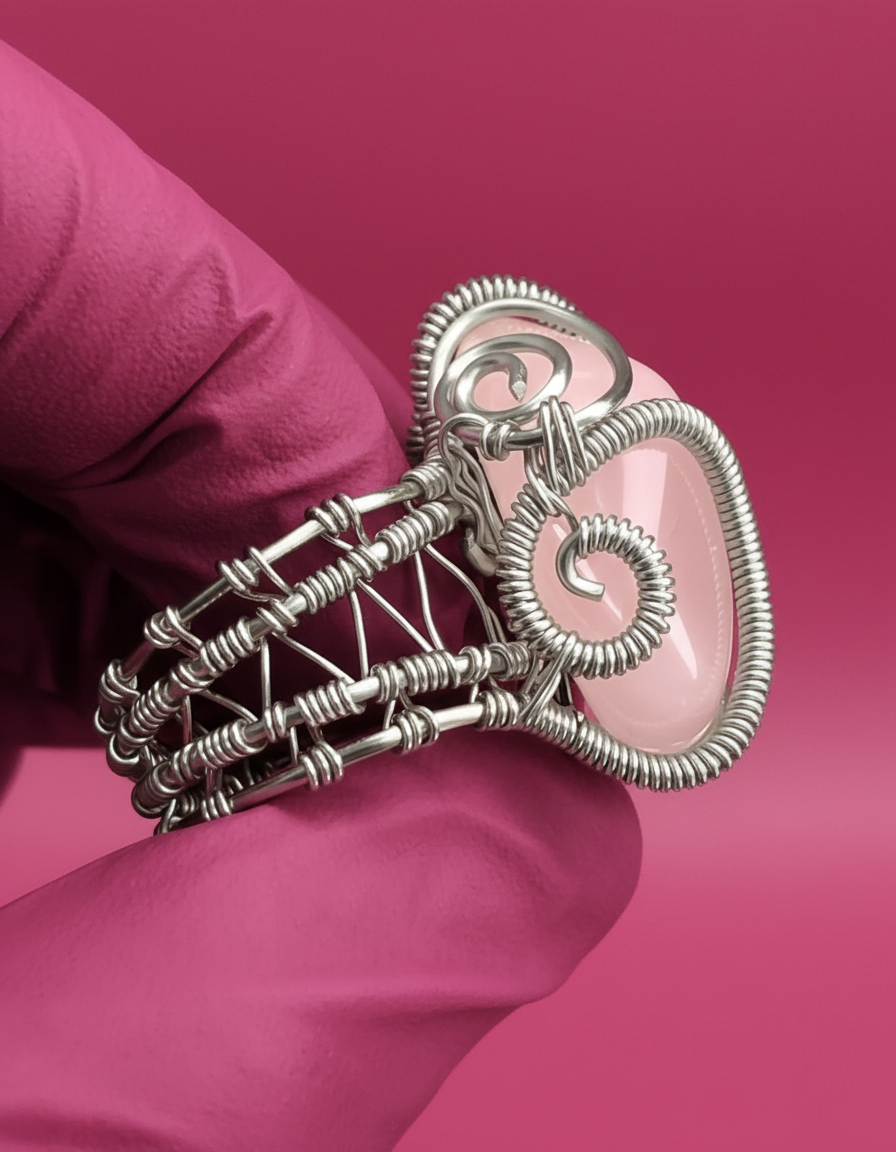 Professional studio shot with pink glove and deep pink lighting