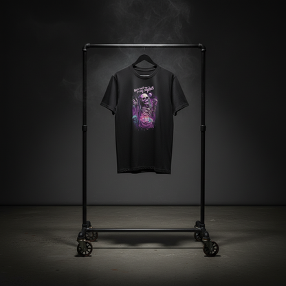 T-shirt hanging on industrial rack with dramatic lighting