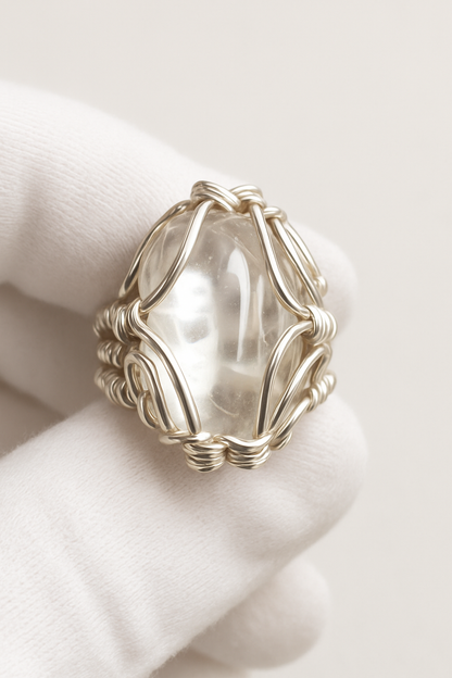 White velvet glove with exact smooth tumbled clear quartz