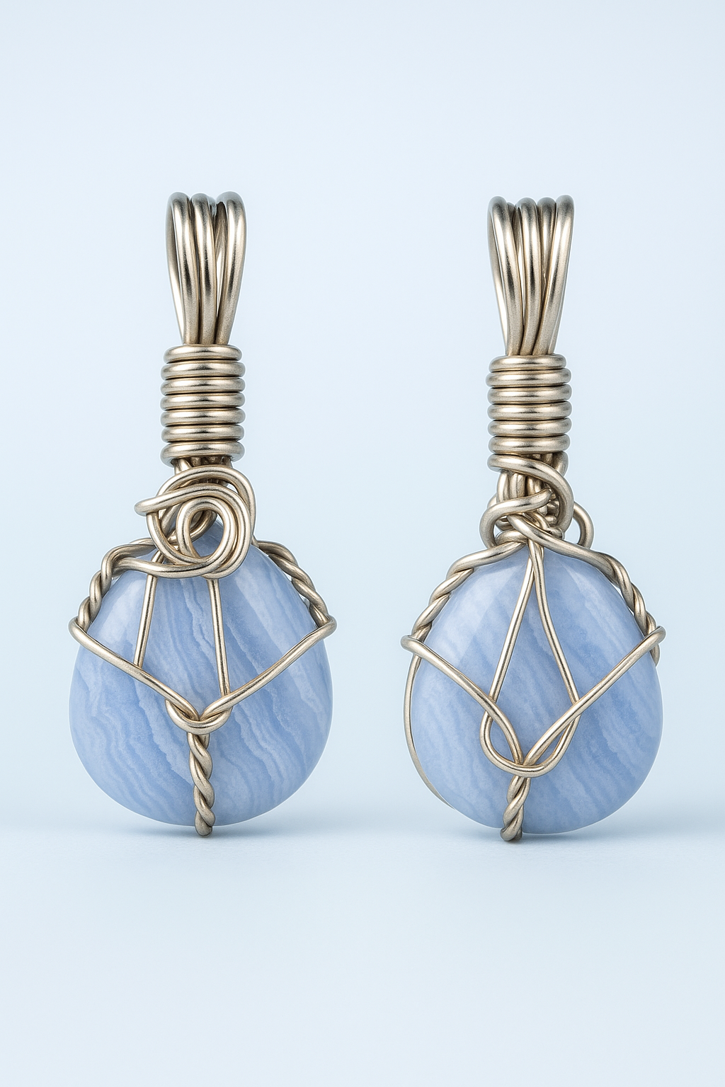 Wire-wrapped pendant front and back views with light blue studio lighting