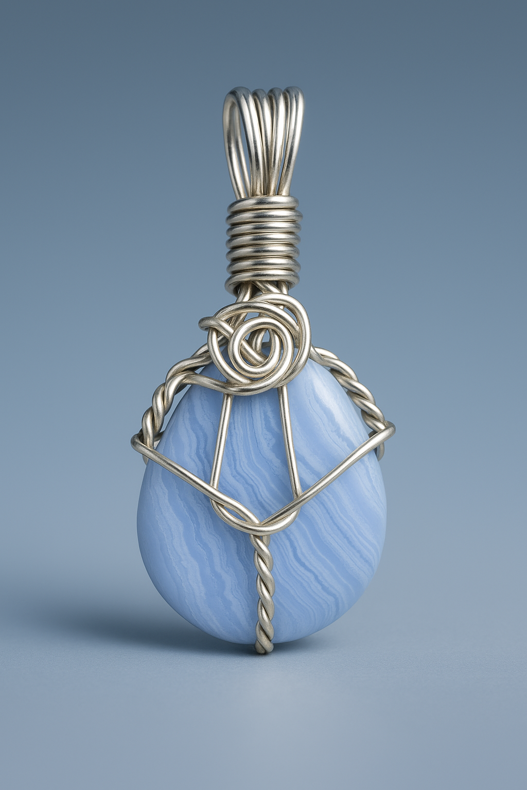 Wire-wrapped pendant with blue studio lighting